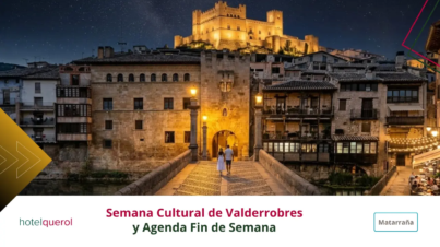 Vista nocturna del puente y el Castillo de Valderrobres iluminados durante los eventos de la Semana Cultural